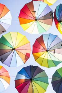 Low angle view of multi colored umbrellas