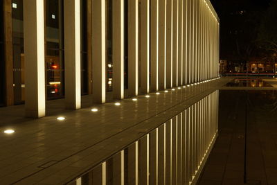 Illuminated modern building in city at night