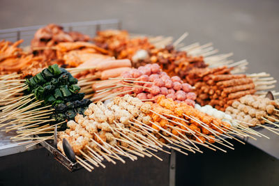 Food skewers for sale at market