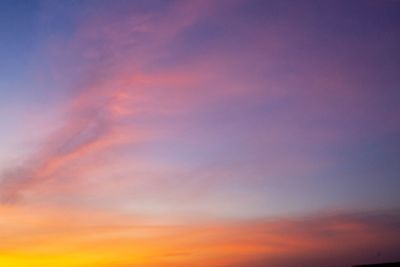 Low angle view of dramatic sky during sunset