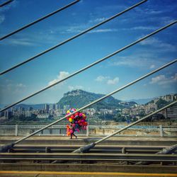 Suspension bridge against sky