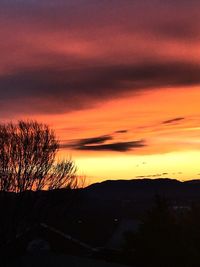 Scenic view of dramatic sky at sunset