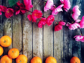 Close-up of flowers on wood