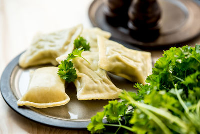 Close-up of vegetables in plate on table