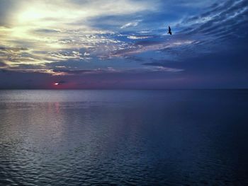 Scenic view of sea at sunset