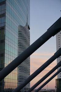 Low angle view of office building against sky