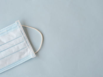 High angle view of eyeglasses against white background