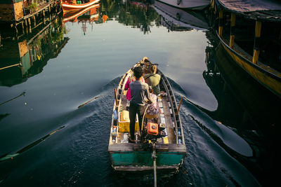 High angle view of boats moored at harbor