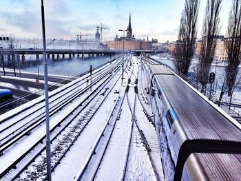 Train on snow covered railroad tracks