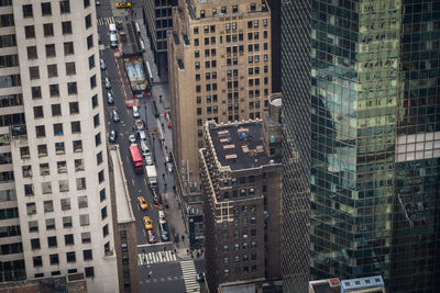 High angle view of street amidst buildings in city