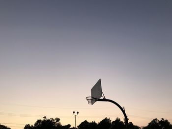 Low angle view of street light against sky