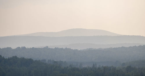 Scenic view of mountains against clear sky