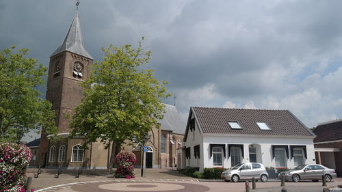 View of buildings in city against sky