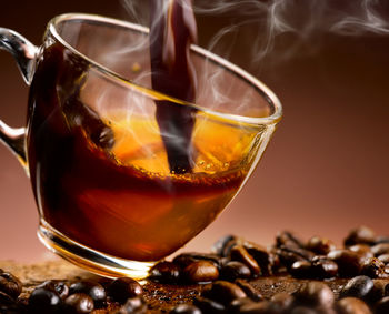 Close-up of coffee served on table