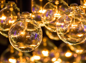 Close-up of illuminated christmas lights on table