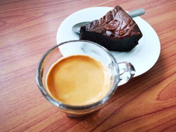 High angle view of coffee cup on table