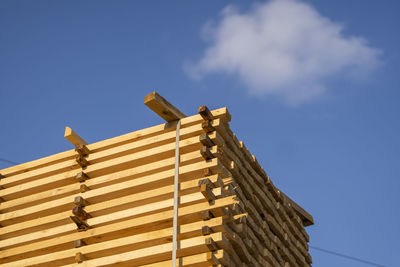 Low angle view of building against blue sky