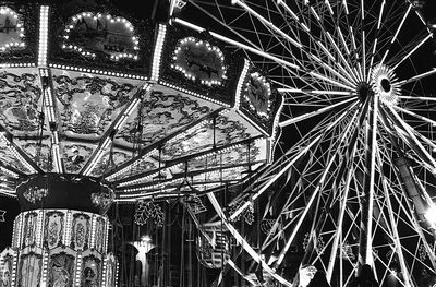 Low angle view of illuminated ferris wheel