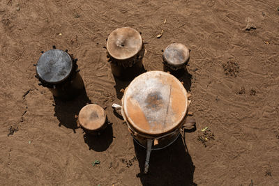 High angle view of firewood in container on field