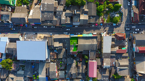 View of green space on the buildings in city