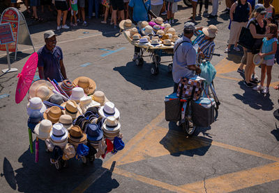 High angle view of people walking on street in city