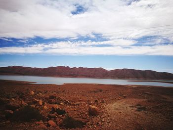 Scenic view of desert against sky