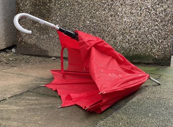 High angle view of red umbrella on street