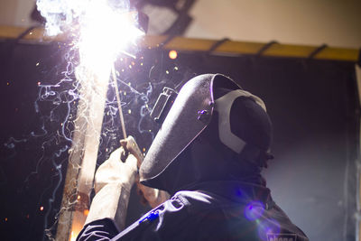 Man working on metal in workshop