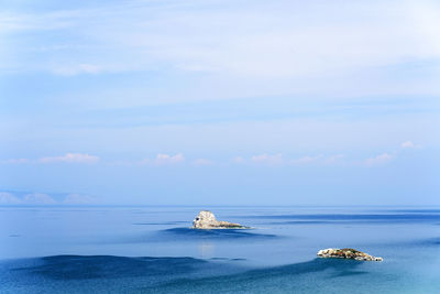 Scenic view of olkhon island against blue sky