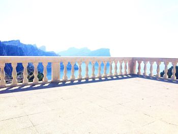 Scenic view of calm sea against clear blue sky