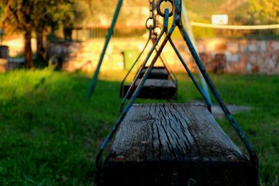 Close-up of swing in park