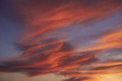 Low angle view of dramatic sky during sunset