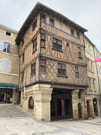 Low angle view of old building against sky