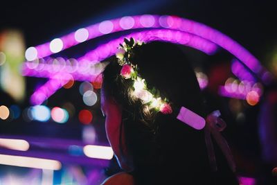 Rear view of woman in music concert