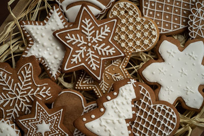 High angle view of cookies on christmas tree during winter