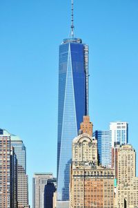 Low angle view of modern buildings against clear sky