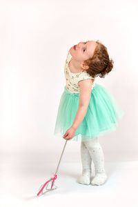 Portrait of girl standing on floor