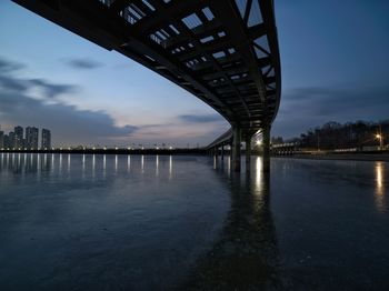 Under the railroad bridge at dawn