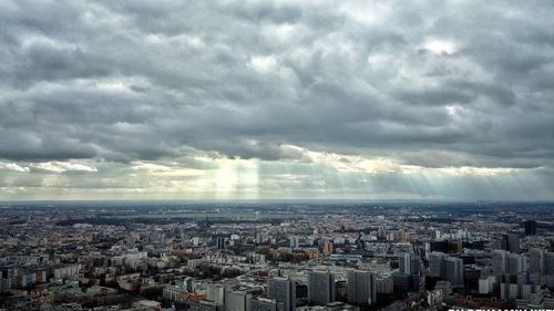High angle view of illuminated cityscape against sky