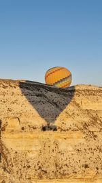 Scenic view of desert against clear sky