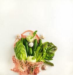 Close-up of food on table against white background