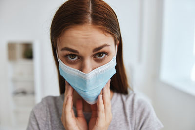 Portrait of woman wearing mask