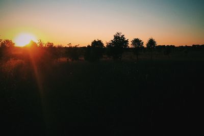 Scenic view of landscape at sunset