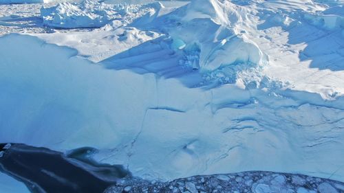 Aerial view of snow covered landscape