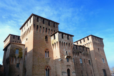 Low angle view of historic building against sky