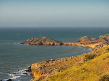 Scenic view of sea against clear sky