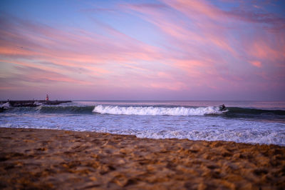 Scenic view of sea against sky during sunset