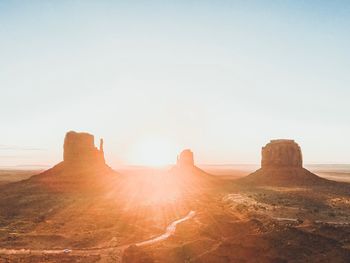 Panoramic view of rock formations against sky