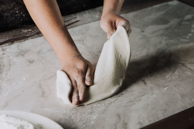 High angle view of man preparing food