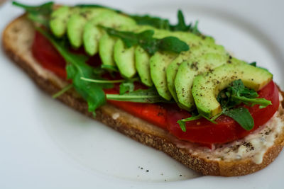 Close-up of sandwich served in plate